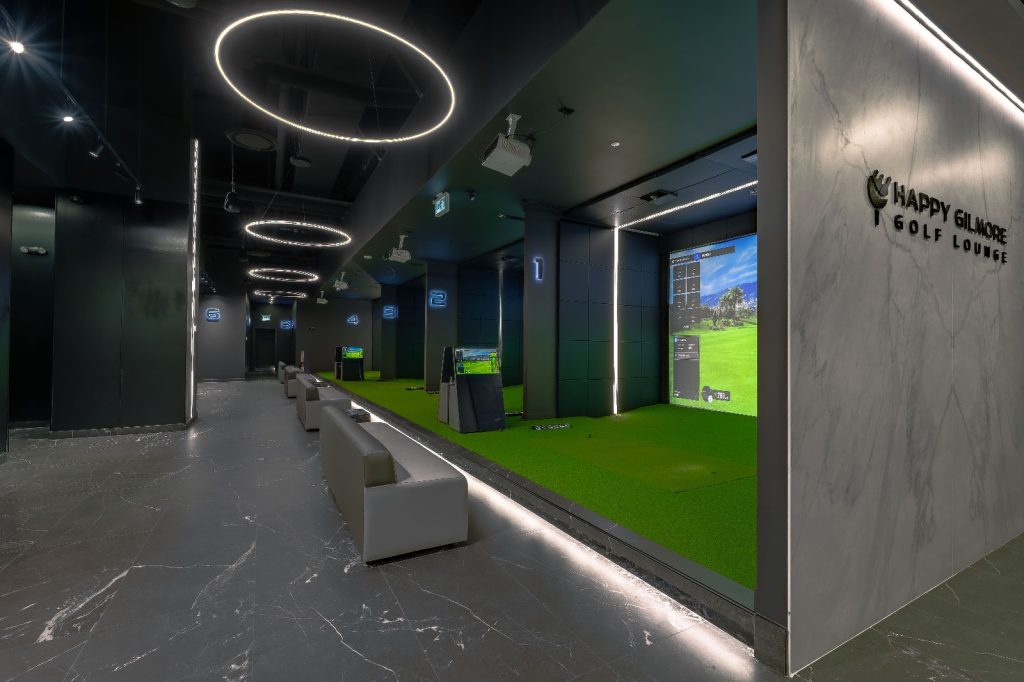 Happy Gilmore Golf Lounge entrance with a view of the Trackman iO Duo Simulators